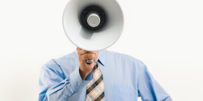Man calling out with a megaphone