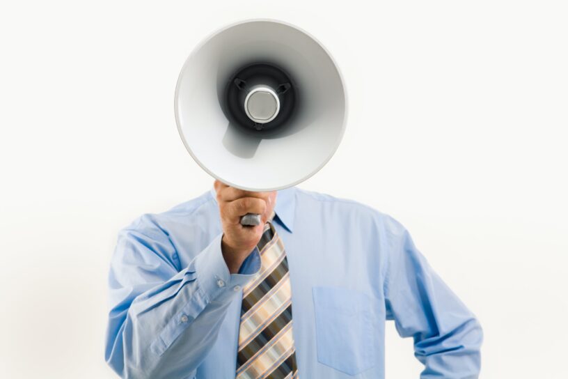 Man calling out with a megaphone